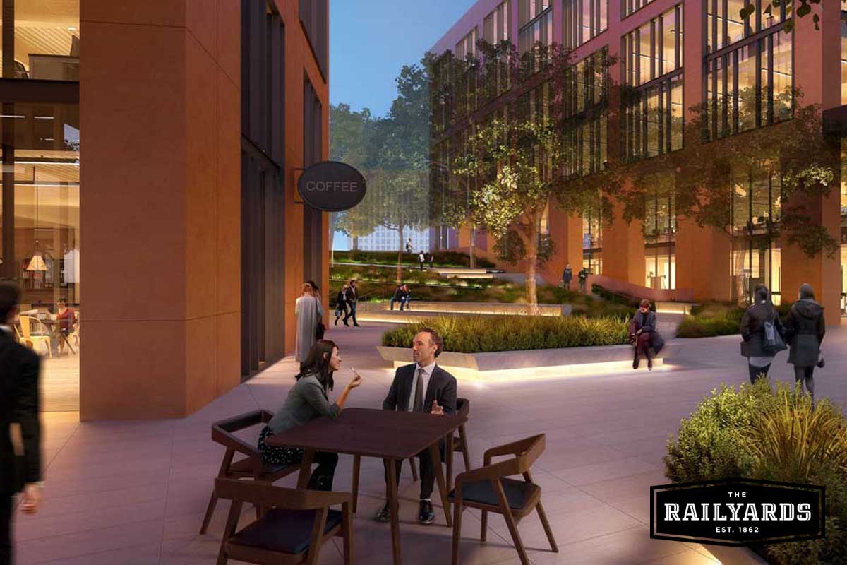 A rendering of workers enjoying coffee in the shared courtyard of the Foundry at the Sacramento Railyards.
