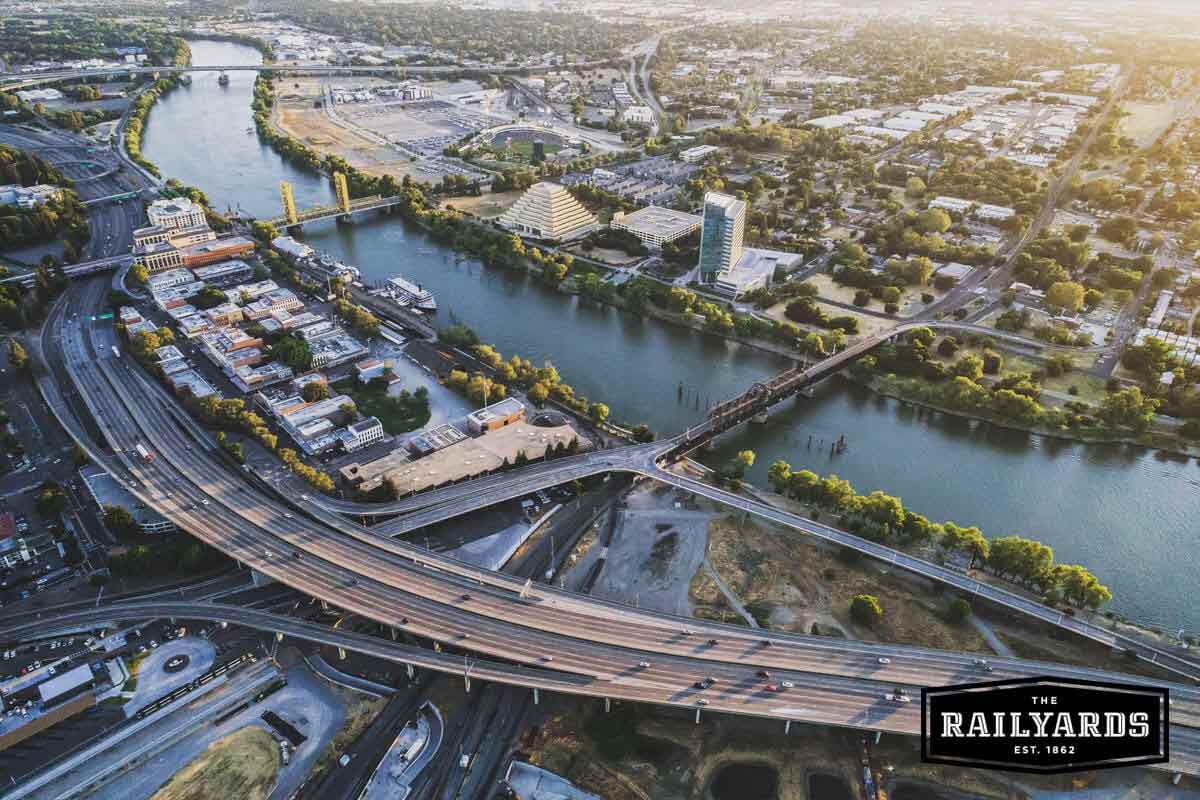 An overhead view of Sacramento's river. Learn how the Railyards will connect this area with downtown.
