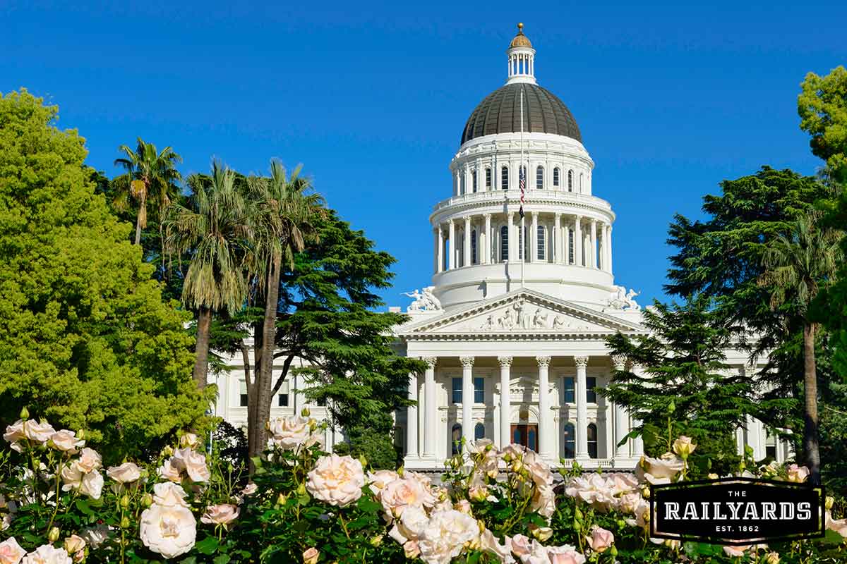 Explore-The-Top-15-Greenest-Cities-in-the-US.jpgThe California State Capitol Building is in the background, with pink roses in the foreground.