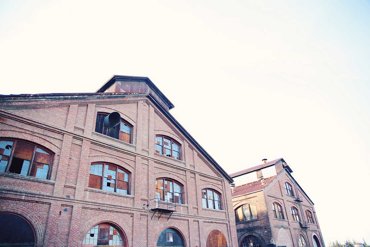 An exterior photo of The Railyards Central Shops buildings in the Sacramento Railyards infill development 